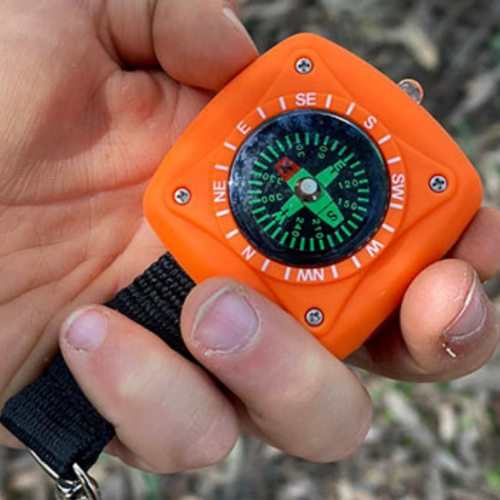 button to buy kids compass and torch