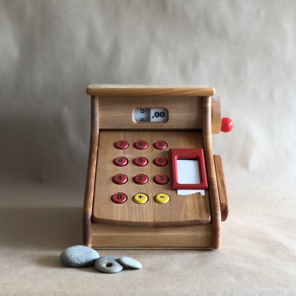 button to buy kids wooden cash register