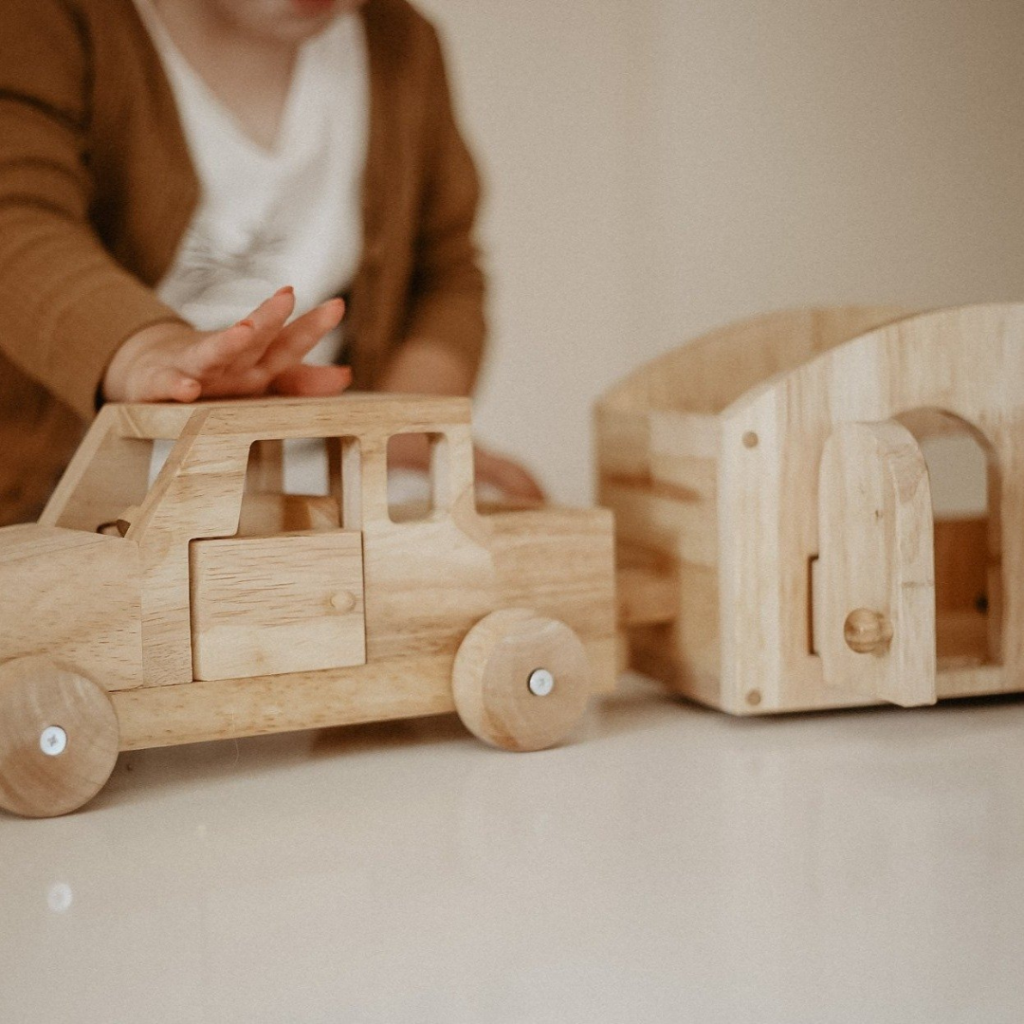 button to buy kids wooden campervan and car